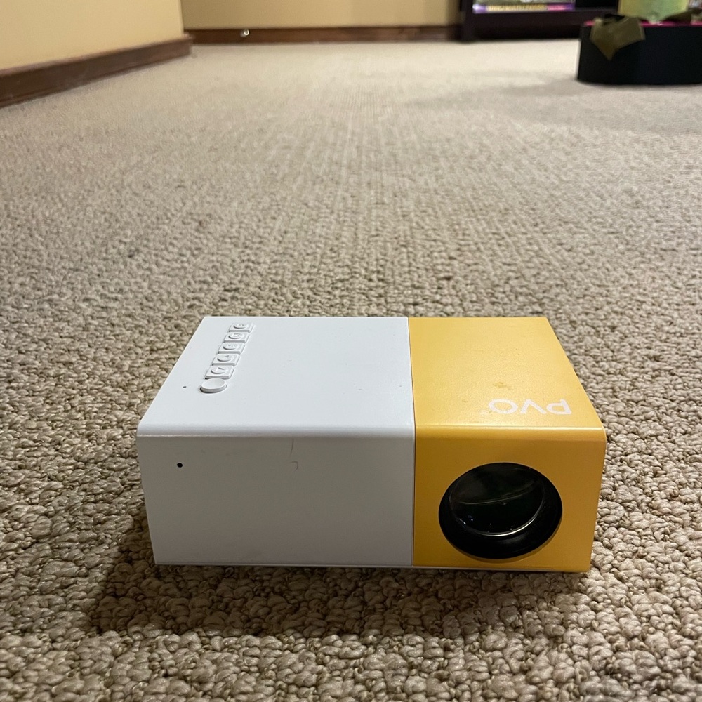 Yellow and White PVO Mini Projector